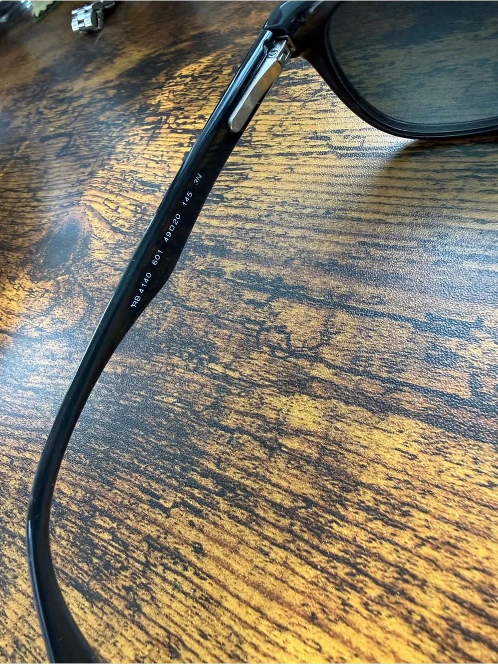Ray-Ban Black Frame Sunglasses with Dark Lenses